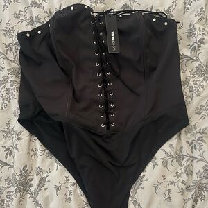 Brand new fashion nova corset body suit size 2X has good stretch